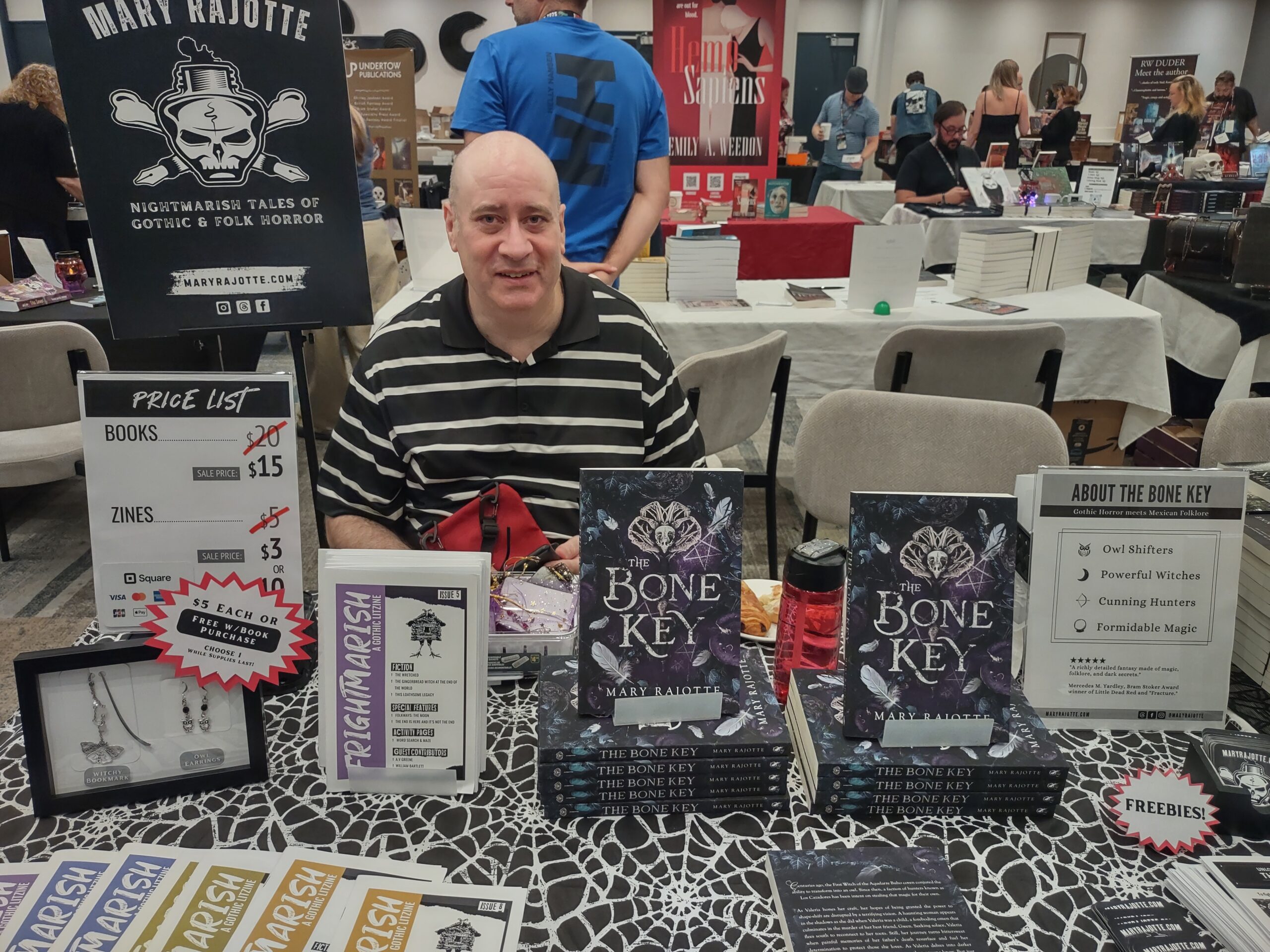 My partner (and helper!) Chris at my table