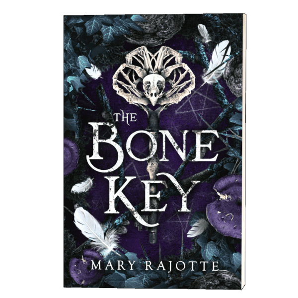 The Bone Key paperback cover with an owl skull atop a bone key, set against a forest floor with white feathers, purple mushrooms and iridescent teal branches
